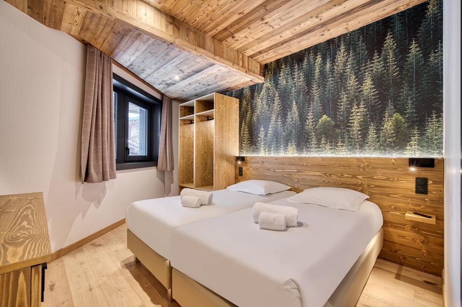 2 lits simple (90*200) avec TV et salle de bain attenante