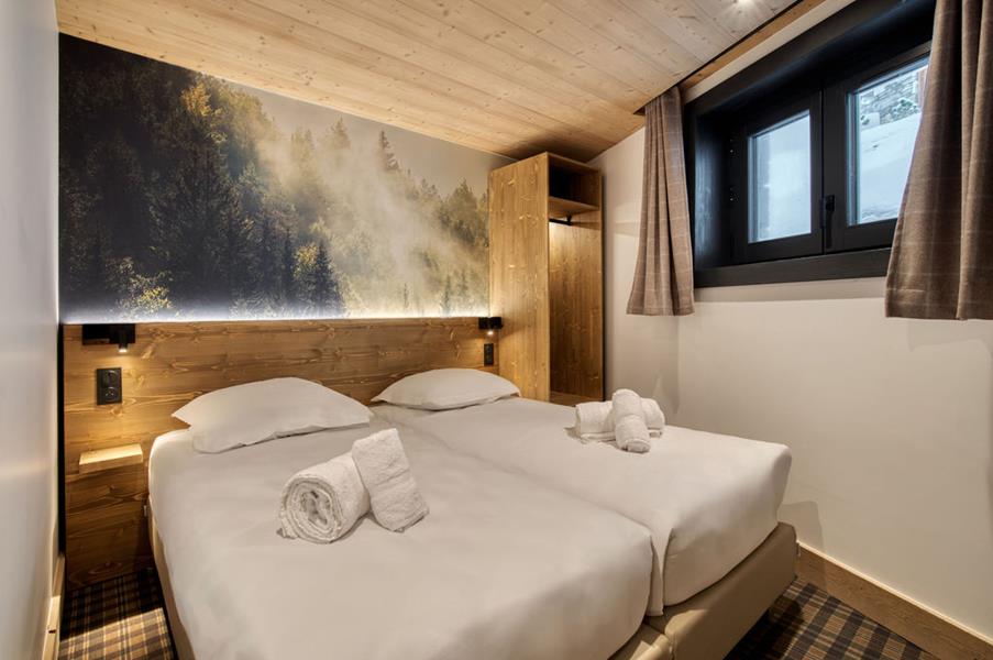 2 lits simples (90*200) avec TV
